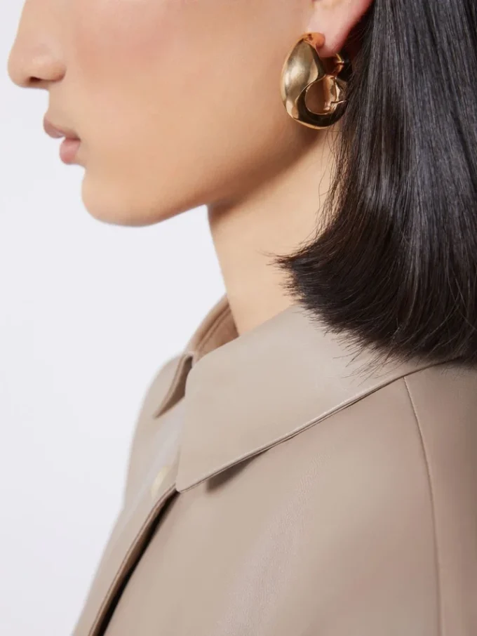 Bold metallic earrings, bronze