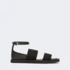 Flat sandals in leather and elasticated webbing, black Flat sandals in leather and elasticated webbing, black