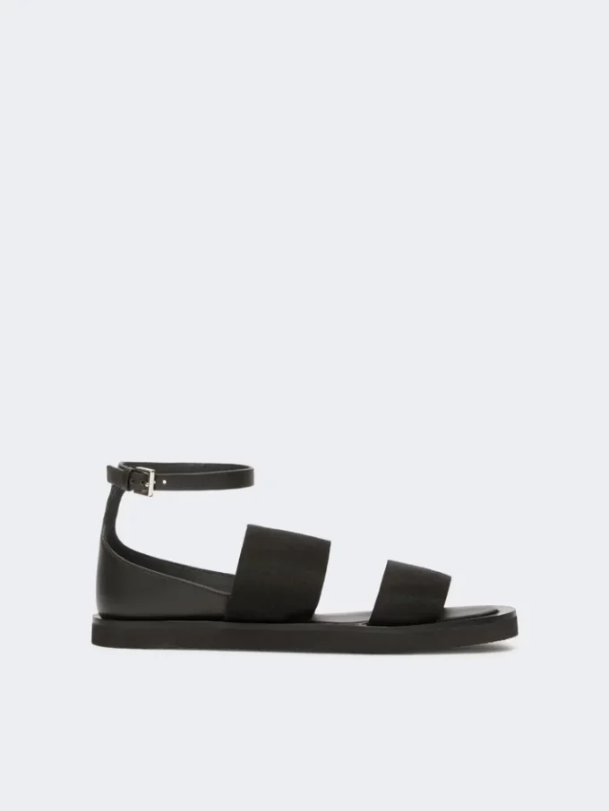 Flat sandals in leather and elasticated webbing, black Flat sandals in leather and elasticated webbing, black