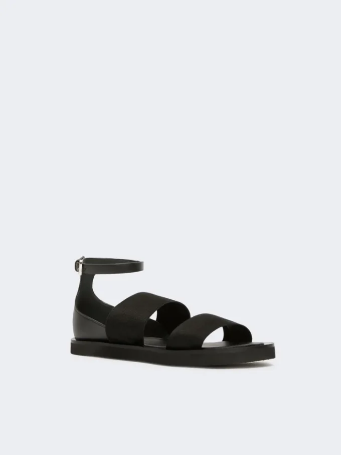 Flat sandals in leather and elasticated webbing, black Flat sandals in leather and elasticated webbing, black