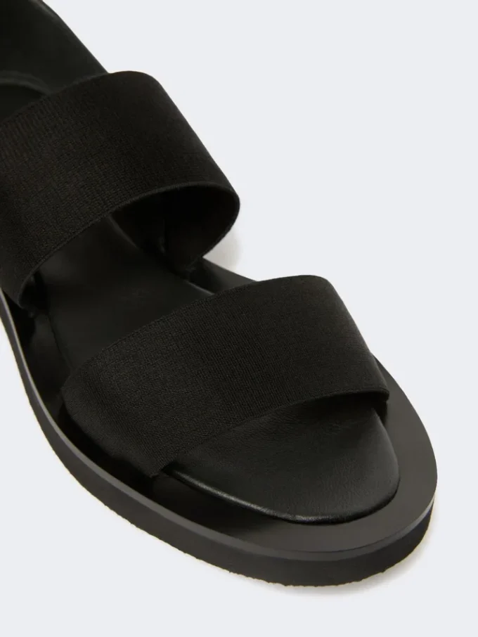 Flat sandals in leather and elasticated webbing, black Flat sandals in leather and elasticated webbing, black