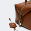 Medium natural leather bowler bag, amber brown