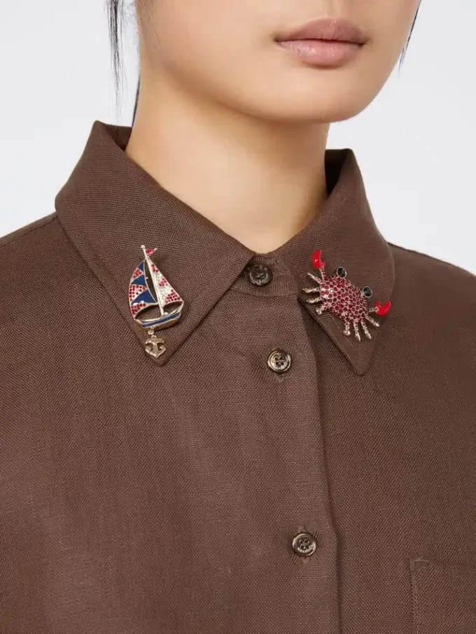 Metal brooch with rhinestones, sky blue