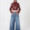 Patent leather cropped jacket with alligator print, dark red