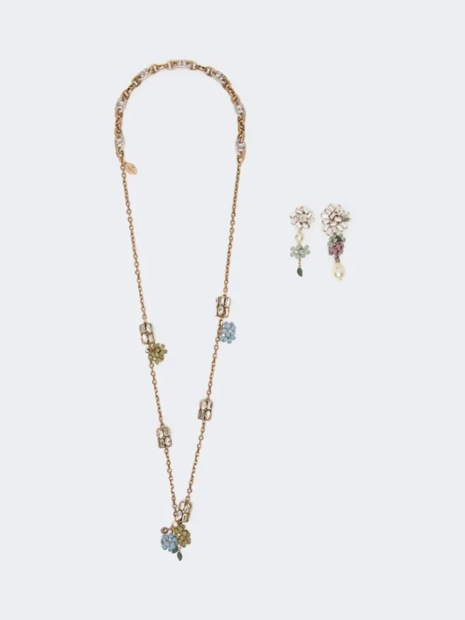 Set with flower and crystal details, gold
