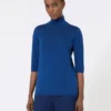 Stockinette-stitched wool polo-neck sweater, china blue