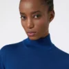 Stockinette-stitched wool polo-neck sweater, china blue