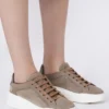 Suede sneakers, mud