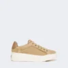 Suede sneakers, sand