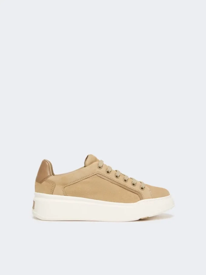Suede sneakers, sand