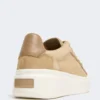 Suede sneakers, sand