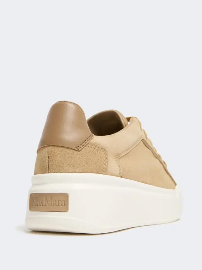 Suede sneakers, sand