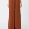 Wide-fit washed silk trousers, terra cotta
